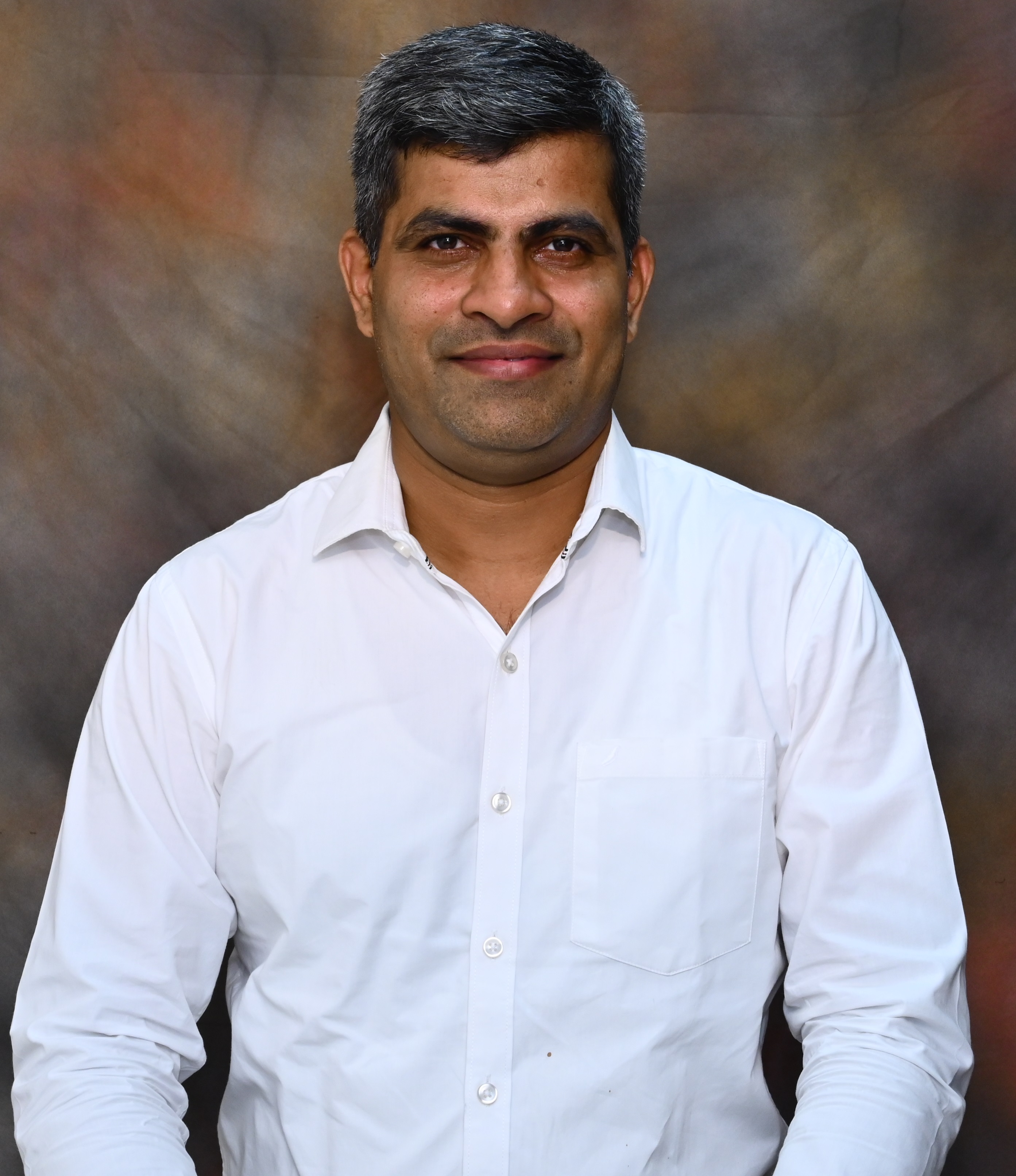 Dr. Milind R. Penurkar